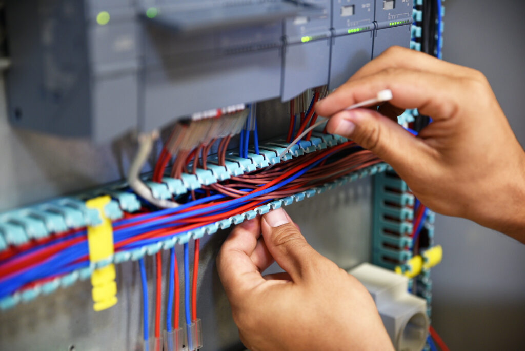electrician working with cable tie